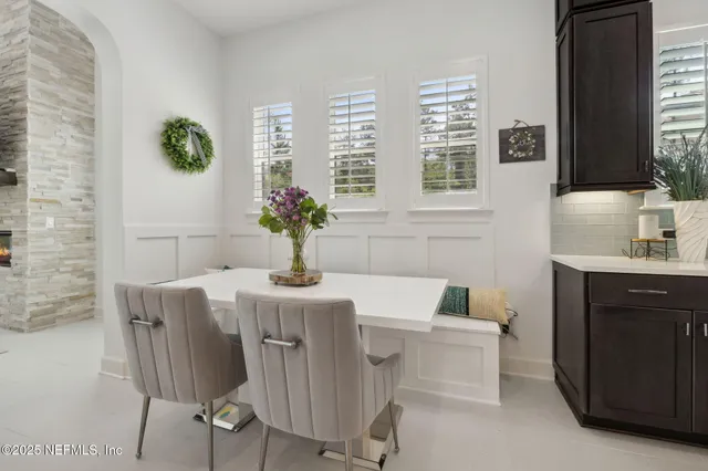 a view of a building with sitting area