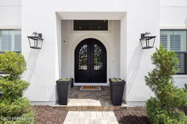 a view of hallway with wooden floor