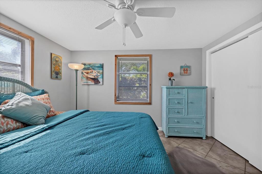 2323 Doud Street Sarasota, FL 34231 - Photo 17 of 34 a bedroom with a bed and a window