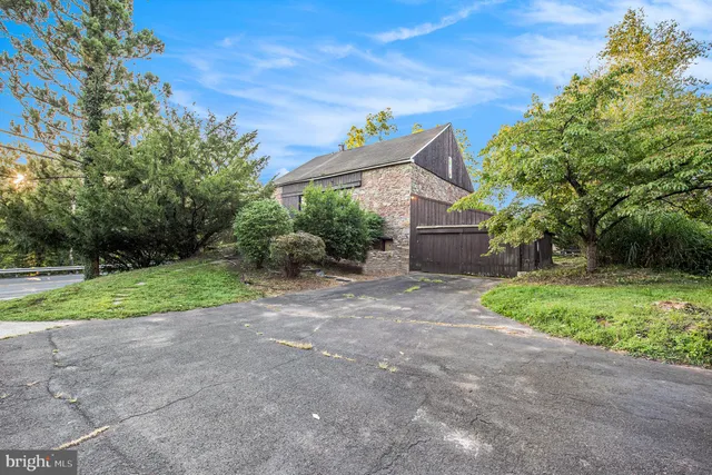 a view of backyard with green space