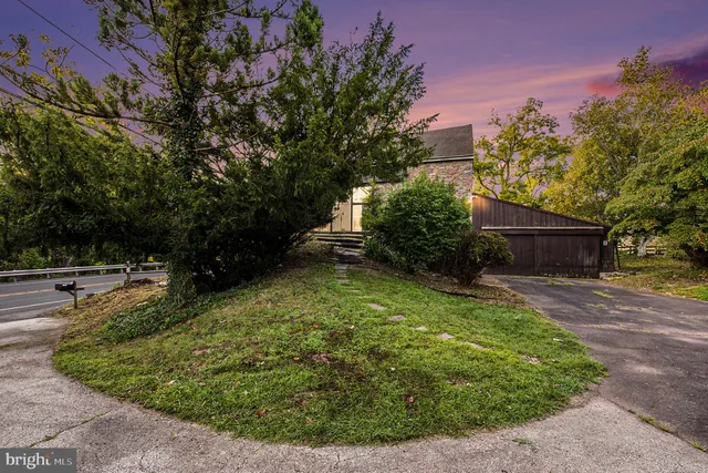 a view of a backyard with a garden