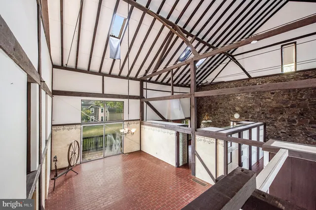 a view of staircase with large window