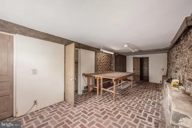 a aerial view of a house with a yard