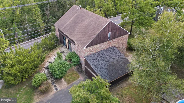 a view of a lake with beach and outdoor space