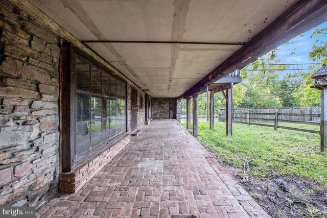 a view of a porch with a backyard