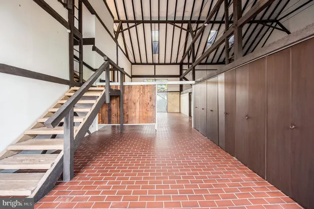 a view of entryway with stairs