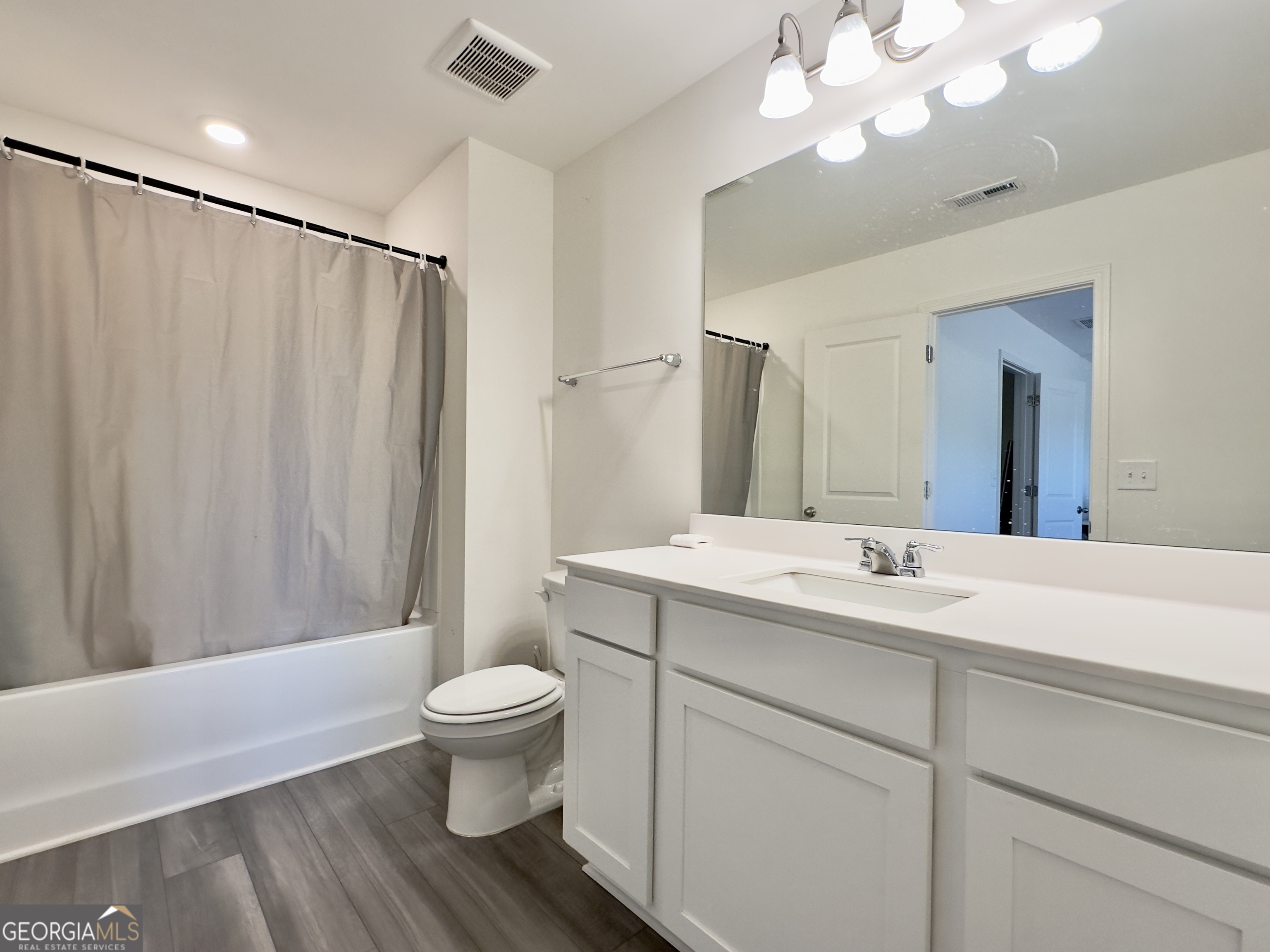 105 Ellicott Way Cartersville, GA 30120 - Photo 13 of 24 a bathroom with a double vanity sink mirror and toilet