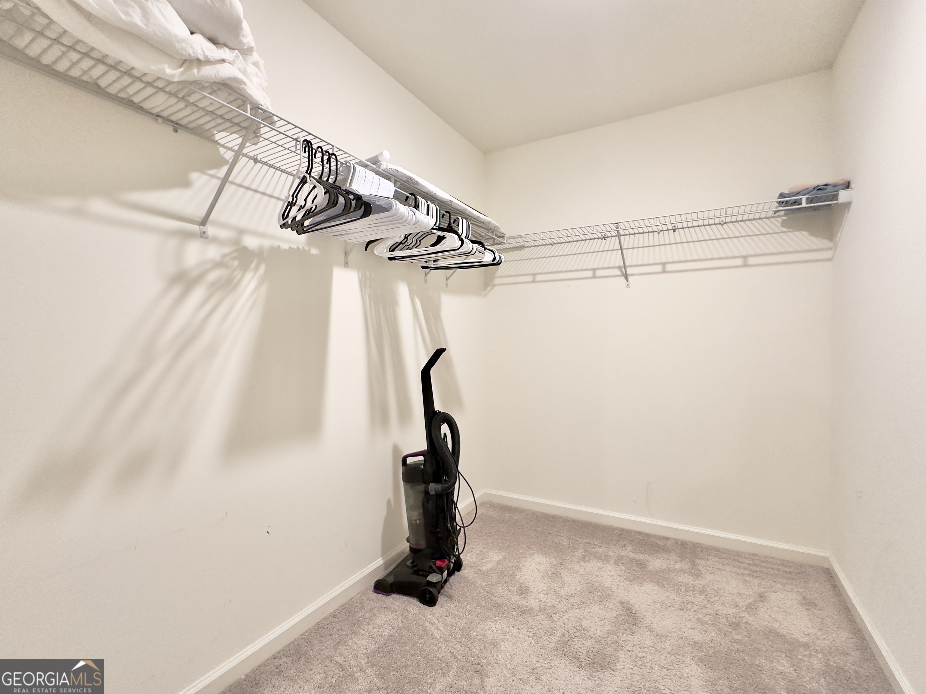 105 Ellicott Way Cartersville, GA 30120 - Photo 15 of 24 a view of a room with racks on the wall