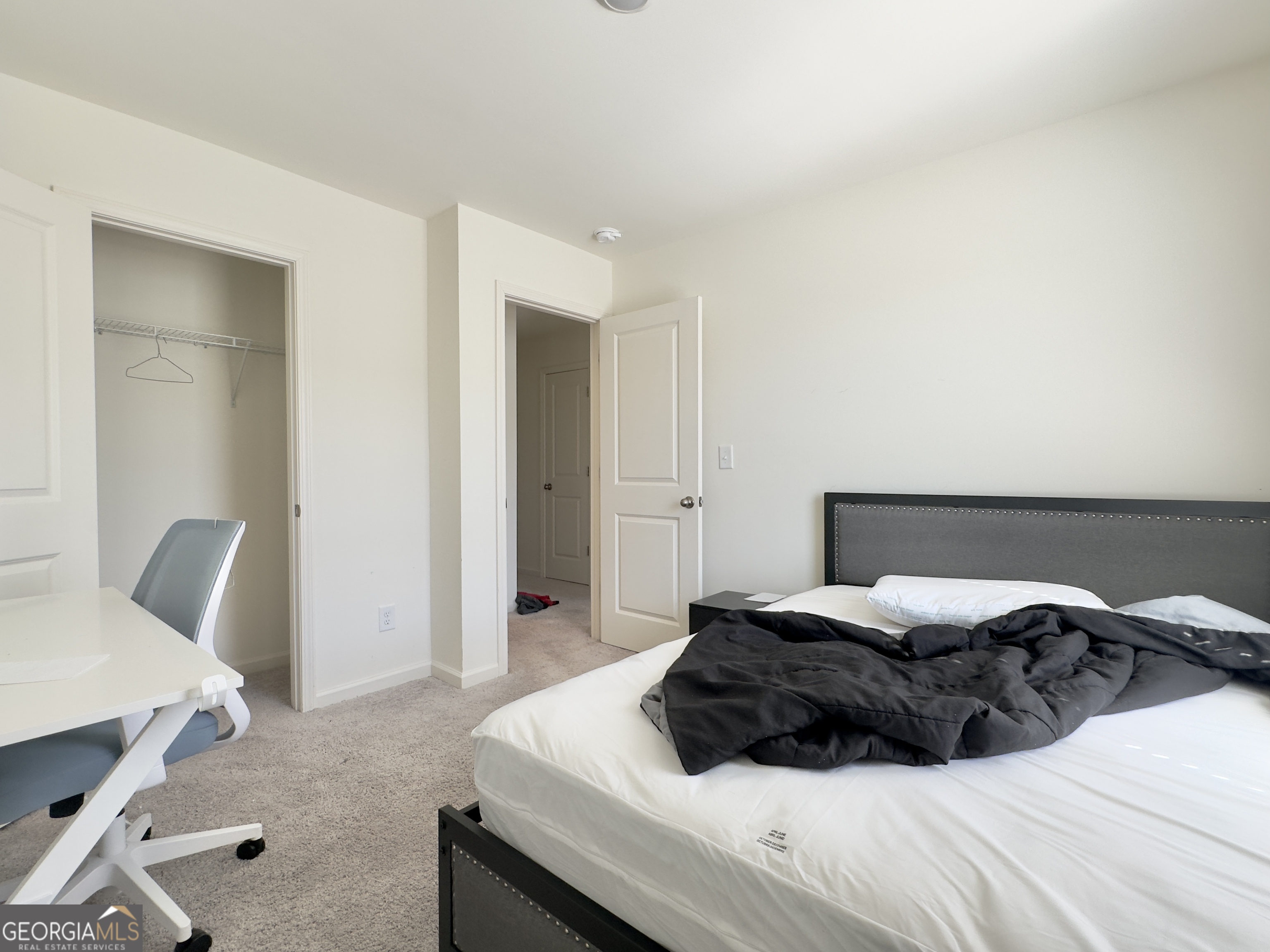 105 Ellicott Way Cartersville, GA 30120 - Photo 20 of 24 a bedroom with a bed and furniture