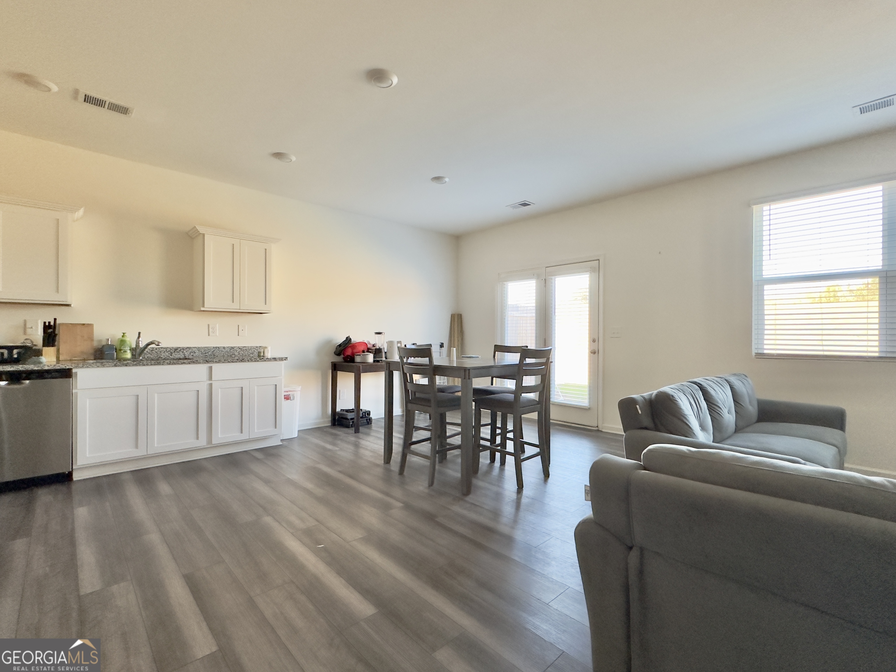 105 Ellicott Way Cartersville, GA 30120 - Photo 7 of 24 a living room with furniture and kitchen view