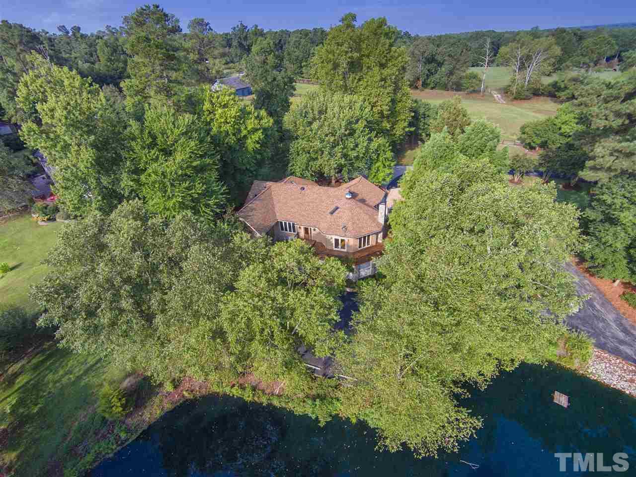 3529 Old Milburnie Road Raleigh, NC 27616 - Photo 1 of 25 an aerial view of a house with a yard