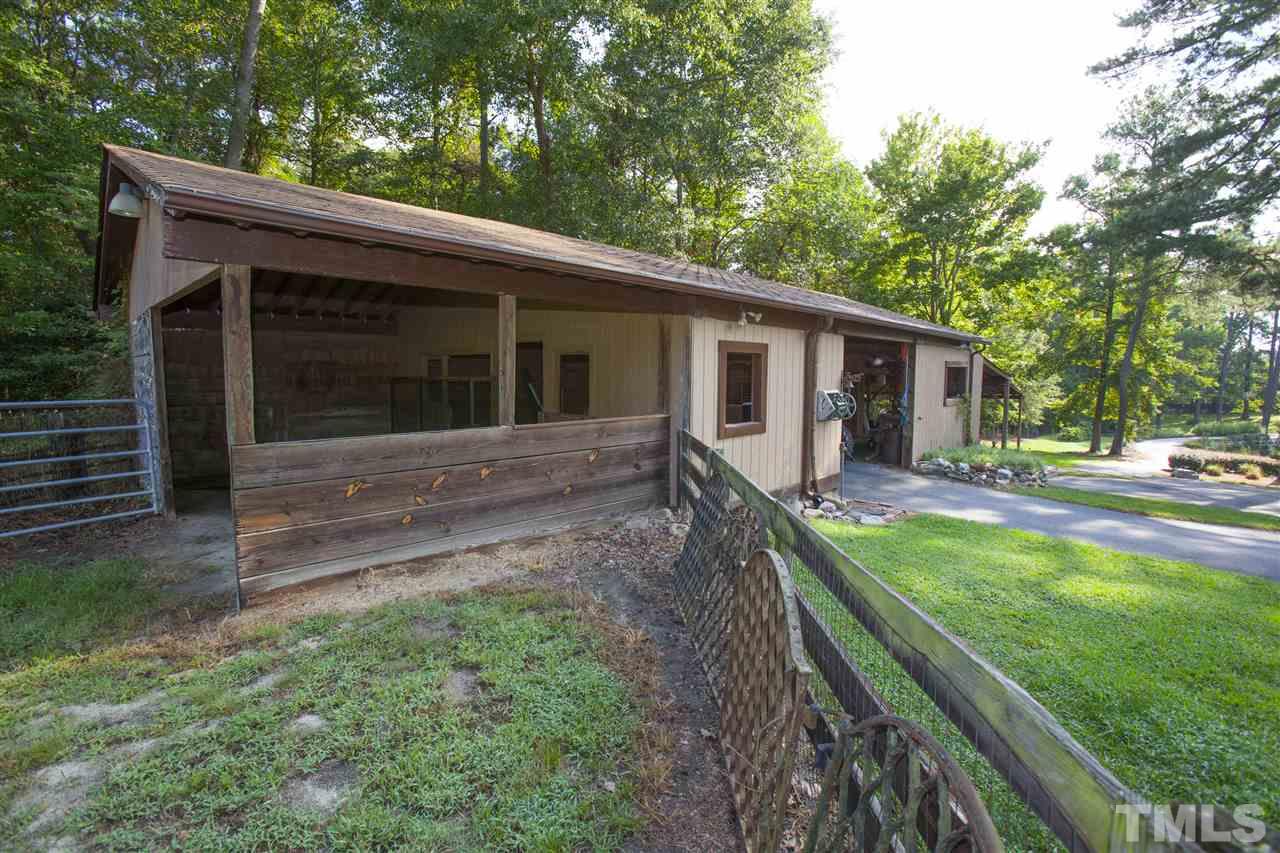 3529 Old Milburnie Road Raleigh, NC 27616 - Photo 21 of 25 a backyard of a house with seating space