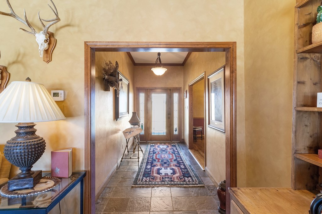 647 Funf Kinder Road Fredericksburg, TX 78624 - Photo 26 of 100 a living room with furniture and a rug