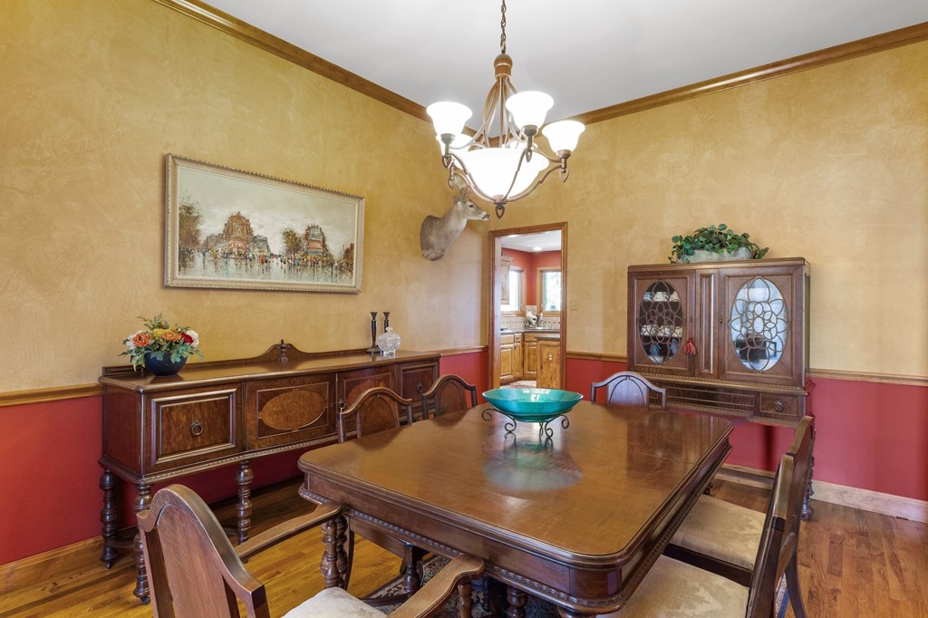647 Funf Kinder Road Fredericksburg, TX 78624 - Photo 41 of 100 a view of a dining room with furniture and chandelier