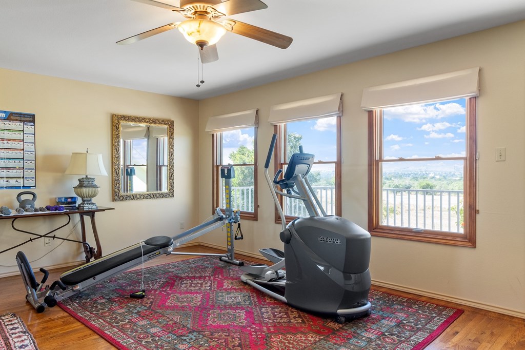 647 Funf Kinder Road Fredericksburg, TX 78624 - Photo 61 of 100 a living room with furniture and a window