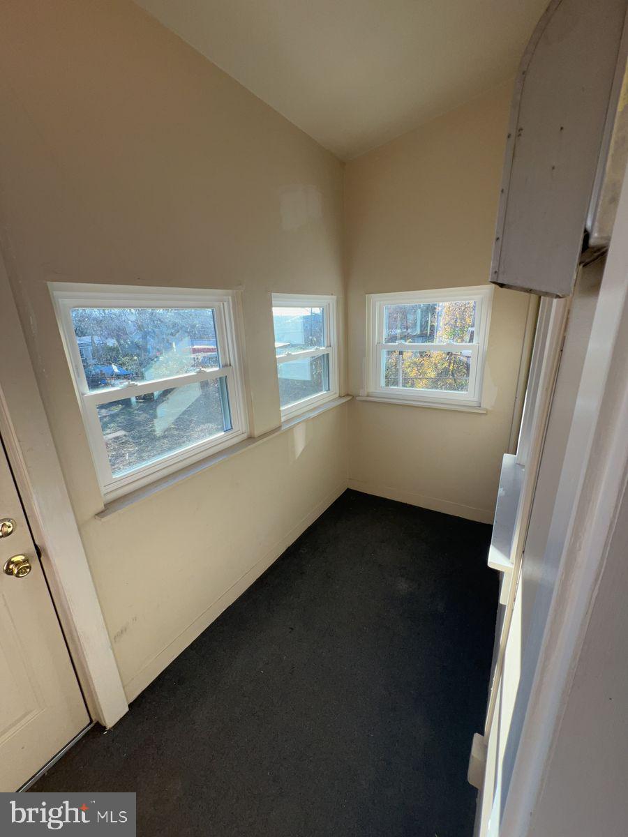 224 South Carroll Street, Unit 1 Frederick, MD 21701 - Photo 10 of 12 a view of an empty room with a window