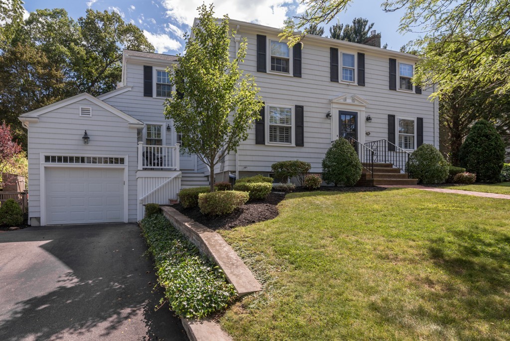 76 Clifton Road Milton, MA 02186 - Photo 1 of 28 front view of a house with a yard