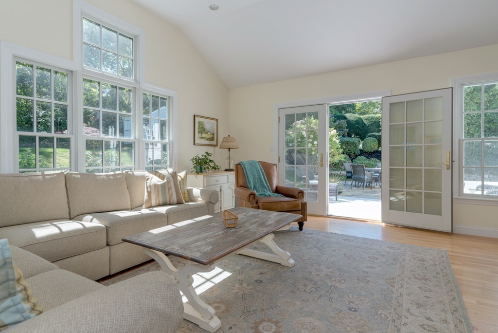 76 Clifton Road Milton, MA 02186 - Photo 12 of 28 a living room with furniture and a large window