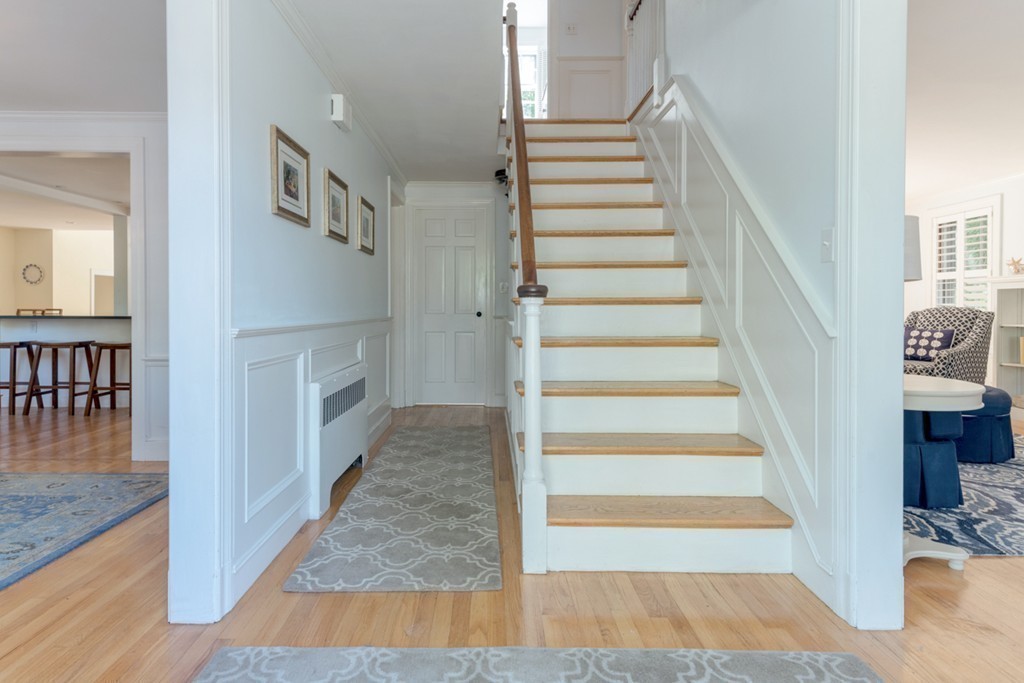 76 Clifton Road Milton, MA 02186 - Photo 15 of 28 a view of entryway and hall with wooden floor