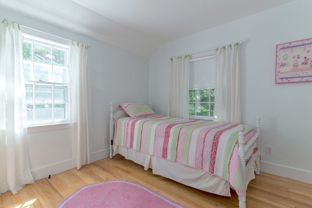 76 Clifton Road Milton, MA 02186 - Photo 18 of 28 a bedroom with a bed and a window