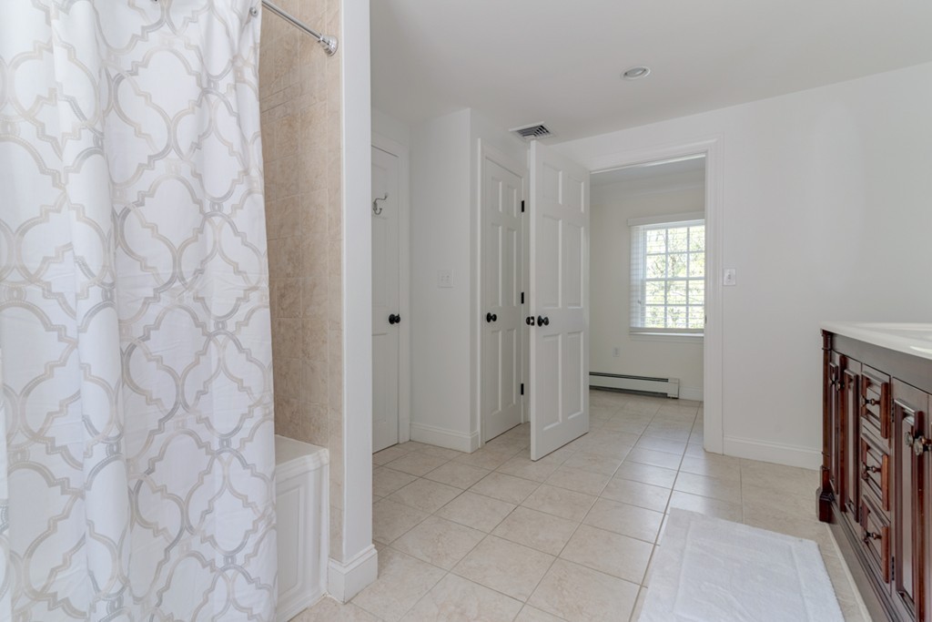 76 Clifton Road Milton, MA 02186 - Photo 20 of 28 a bathroom with a shower and a sink
