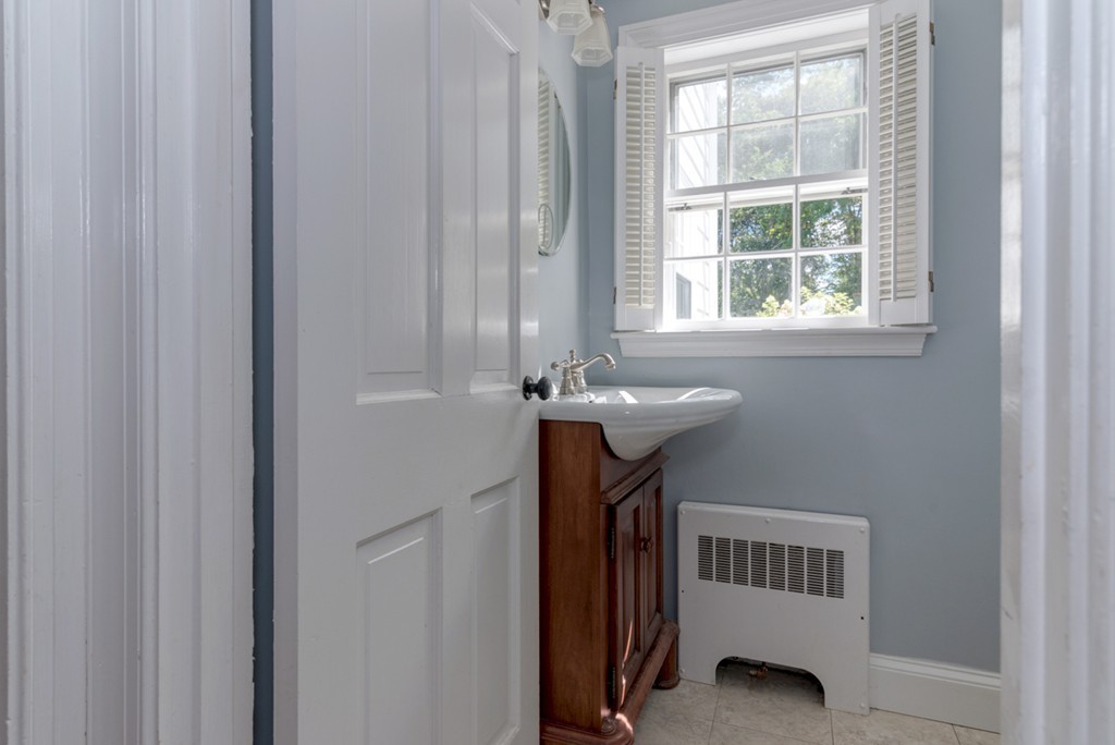 76 Clifton Road Milton, MA 02186 - Photo 22 of 28 a view of entryway with a window