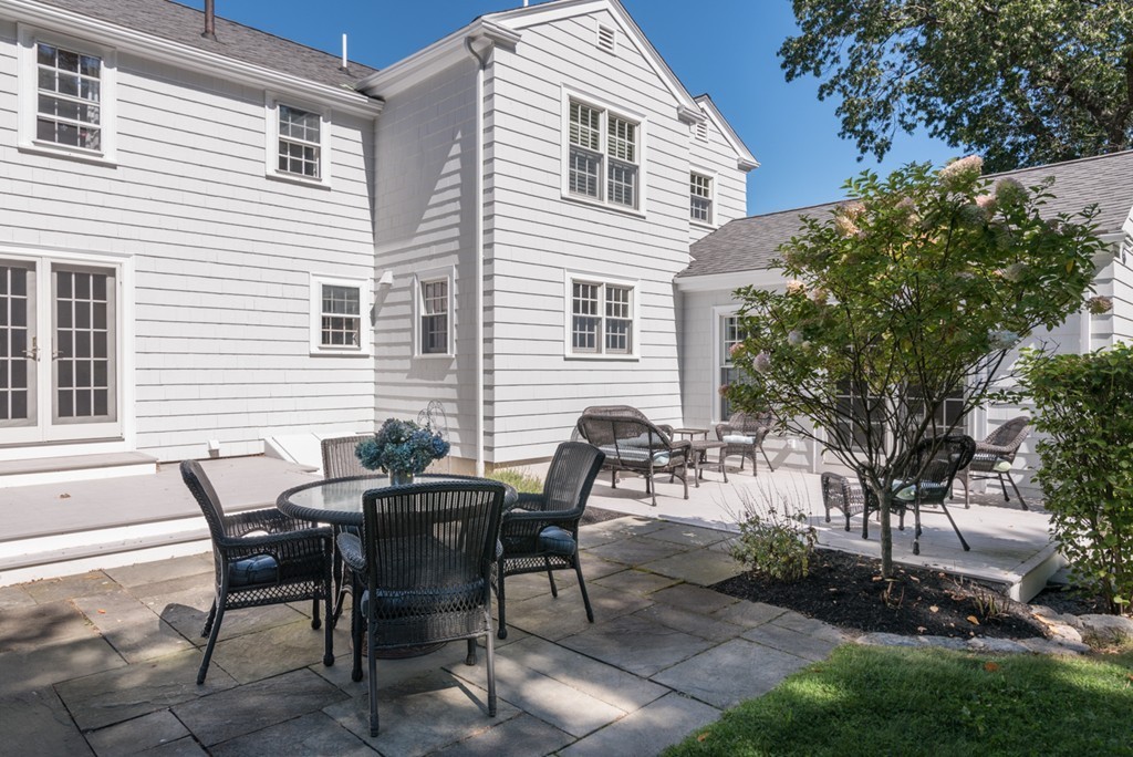 76 Clifton Road Milton, MA 02186 - Photo 26 of 28 a view of a house with patio and a yard
