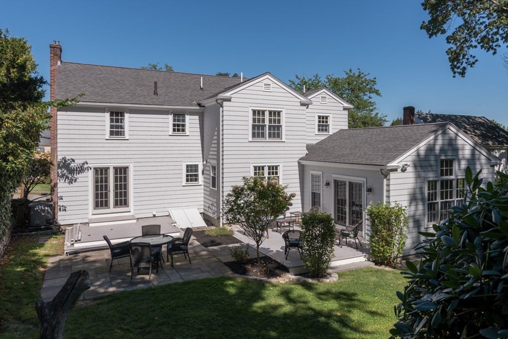 76 Clifton Road Milton, MA 02186 - Photo 28 of 28 a view of a house with a yard and sitting area
