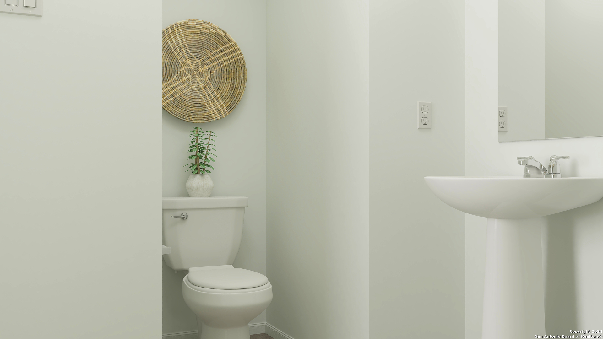 11910 Spiderwort Ridge Converse, TX 78109 - Photo 13 of 22 a bathroom with a toilet sink and mirror