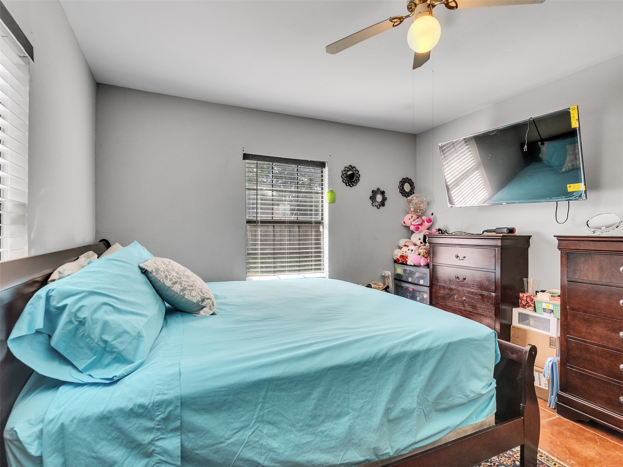 6802 Force Street Houston, TX 77020 - Photo 20 of 31 a bedroom with a bed and window