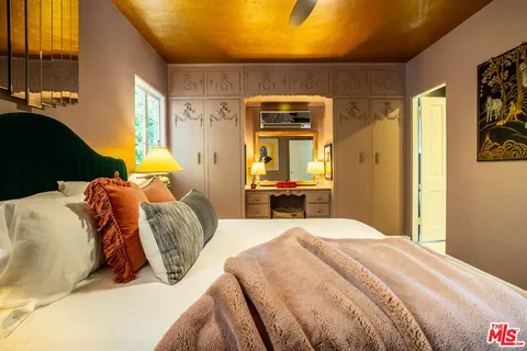 a outdoor living space with furniture and a potted plant