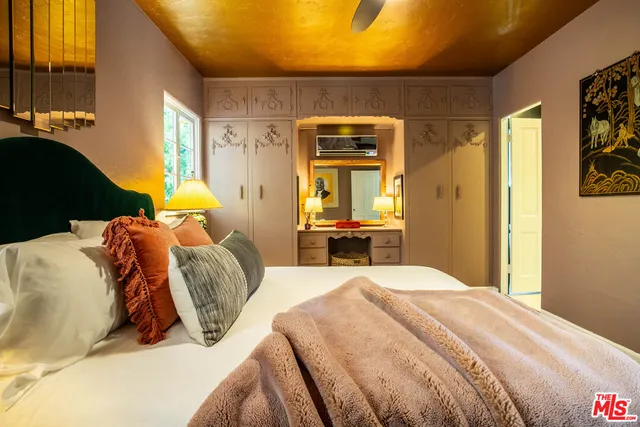 a outdoor living space with furniture and a potted plant