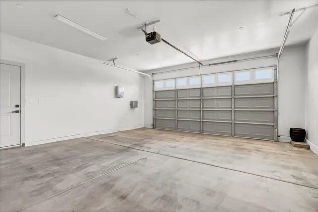 a view of a patio with wooden floor and outdoor seating