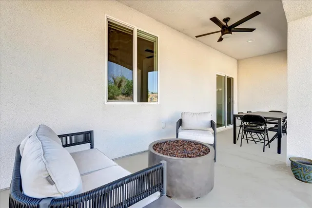 a view of a backyard of the house