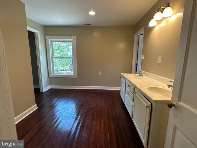 a bathroom with a shower and a toilet