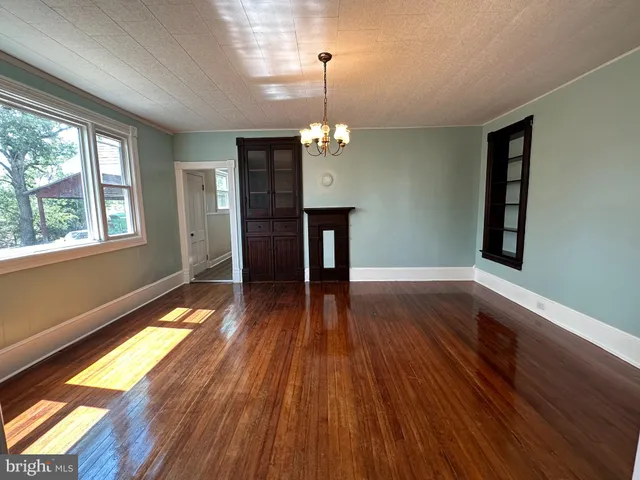a kitchen with a refrigerator stove and sink