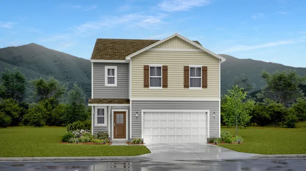 a front view of a house with a yard