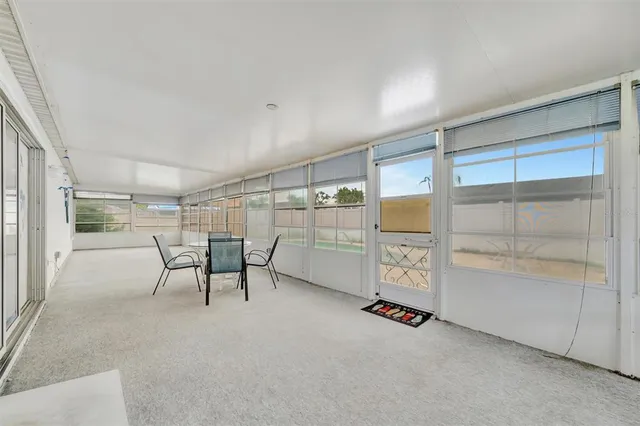 a room with furniture and a window