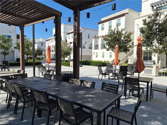 a view of a building with sitting area