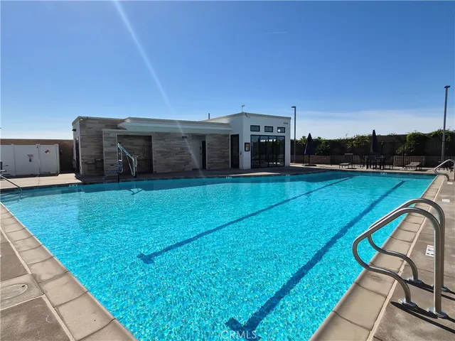 a view of a patio with swimming pool