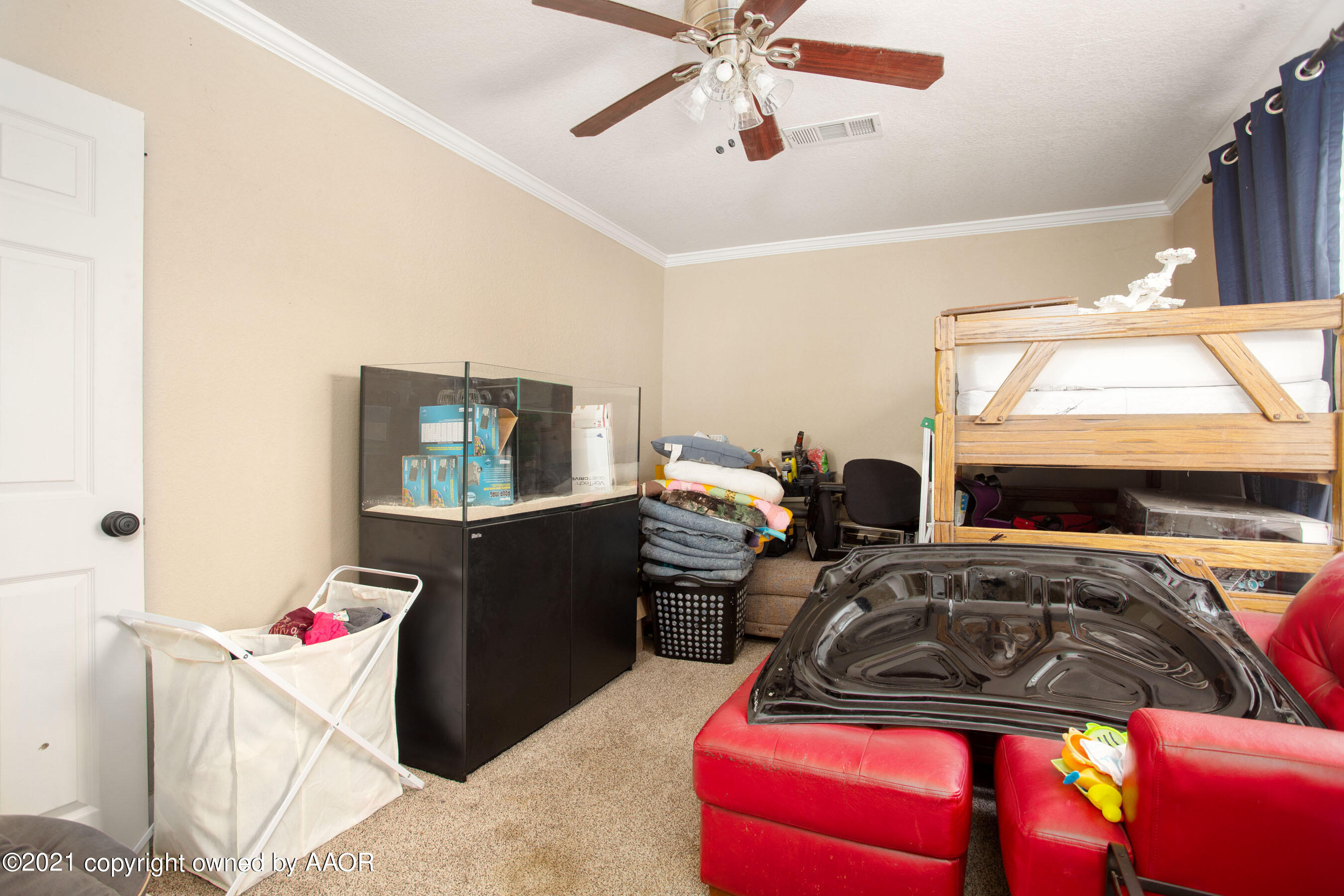 4209 South Jackson Street Amarillo, TX 79110 - Photo 11 of 18 a bedroom with a bed and window