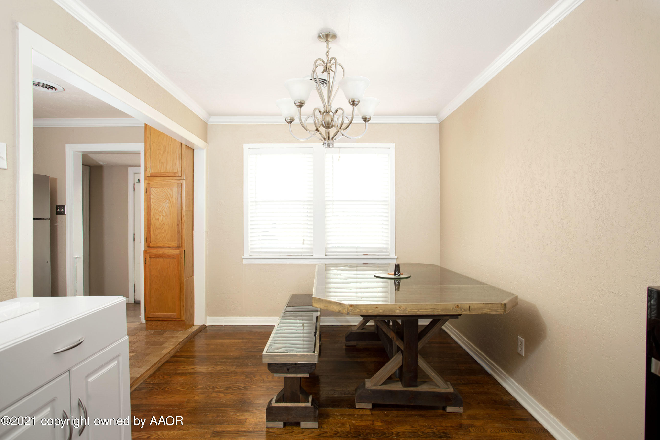 4209 South Jackson Street Amarillo, TX 79110 - Photo 8 of 18 a view of a dining room with furniture and window