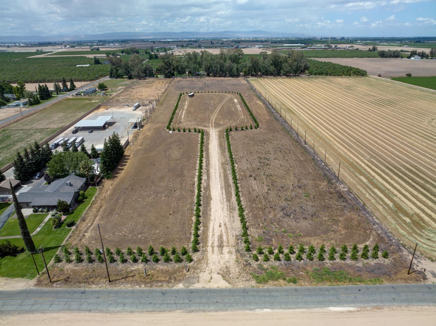 10115 Golf Link Road Turlock, CA 95380 - Photo 1 of 1 an aerial view of a house with a yard