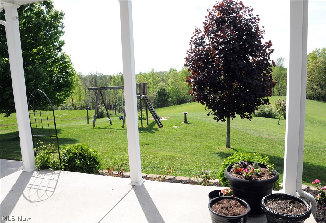 68397 Wintergreen Road Lore City, OH 43755 - Photo 25 of 35 Back porch