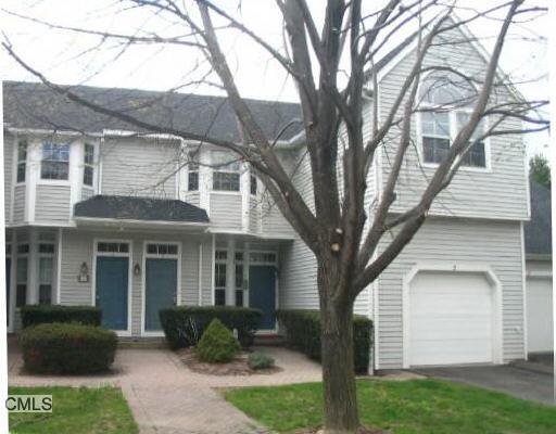 4 Rivendell Drive Shelton, CT 06484 - Photo 1 of 1 a front view of a house with garden
