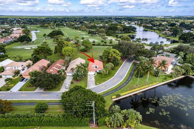 an aerial view of residential house and outdoor space