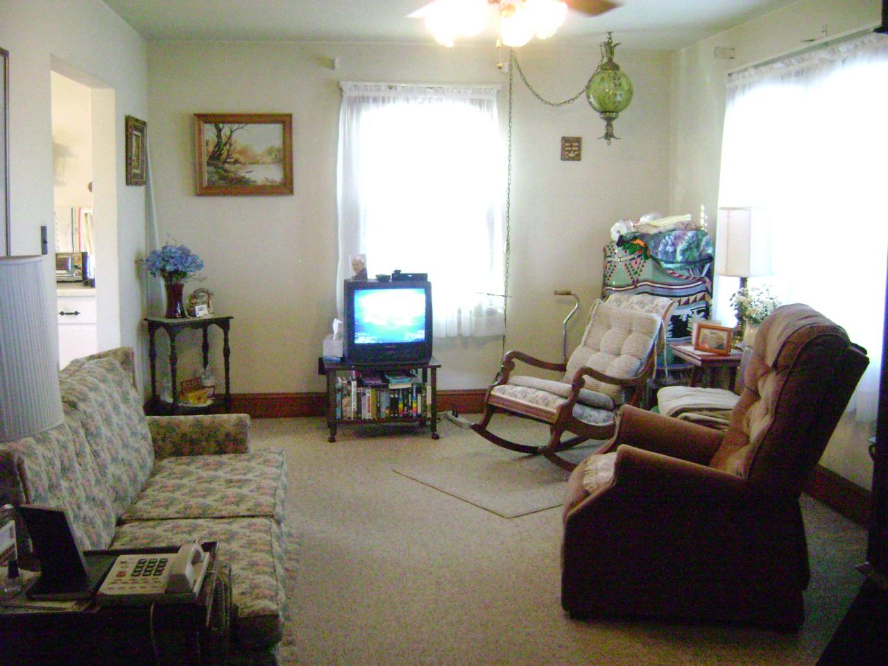 2803 Highland Road Roanoke, VA 24014 - Photo 2 of 10 a living room with furniture and a chandelier