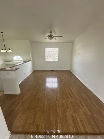 wooden floor in a hall with an entryway