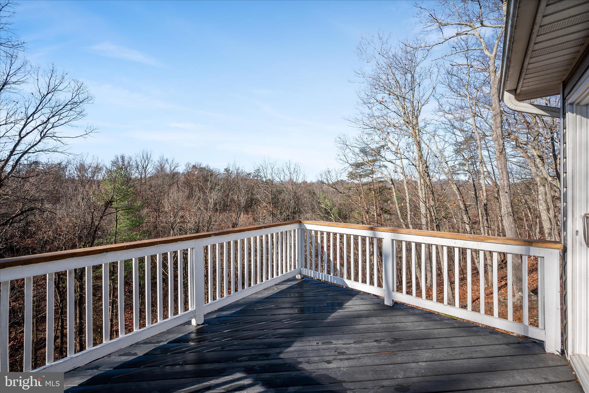 181 Brook View Road Front Royal, VA 22630 - Photo 11 of 47 a terrace view with wooden floor and fence