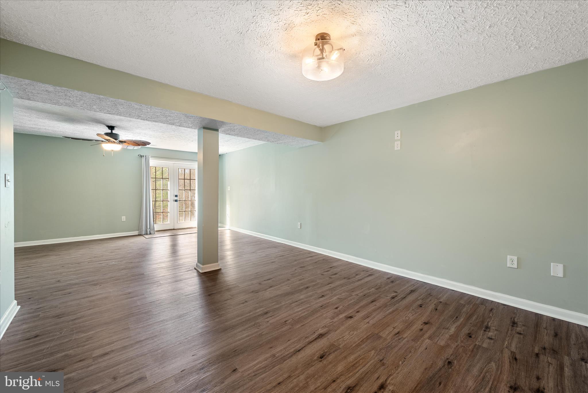 181 Brook View Road Front Royal, VA 22630 - Photo 20 of 47 a view of an empty room with wooden floor